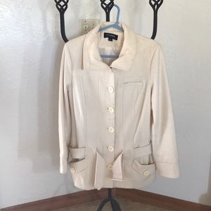 Cream colored dress coat from Coffeeshop NY